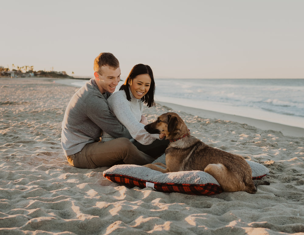 A husband and wife at Tamarack Beach in Carlsbad California