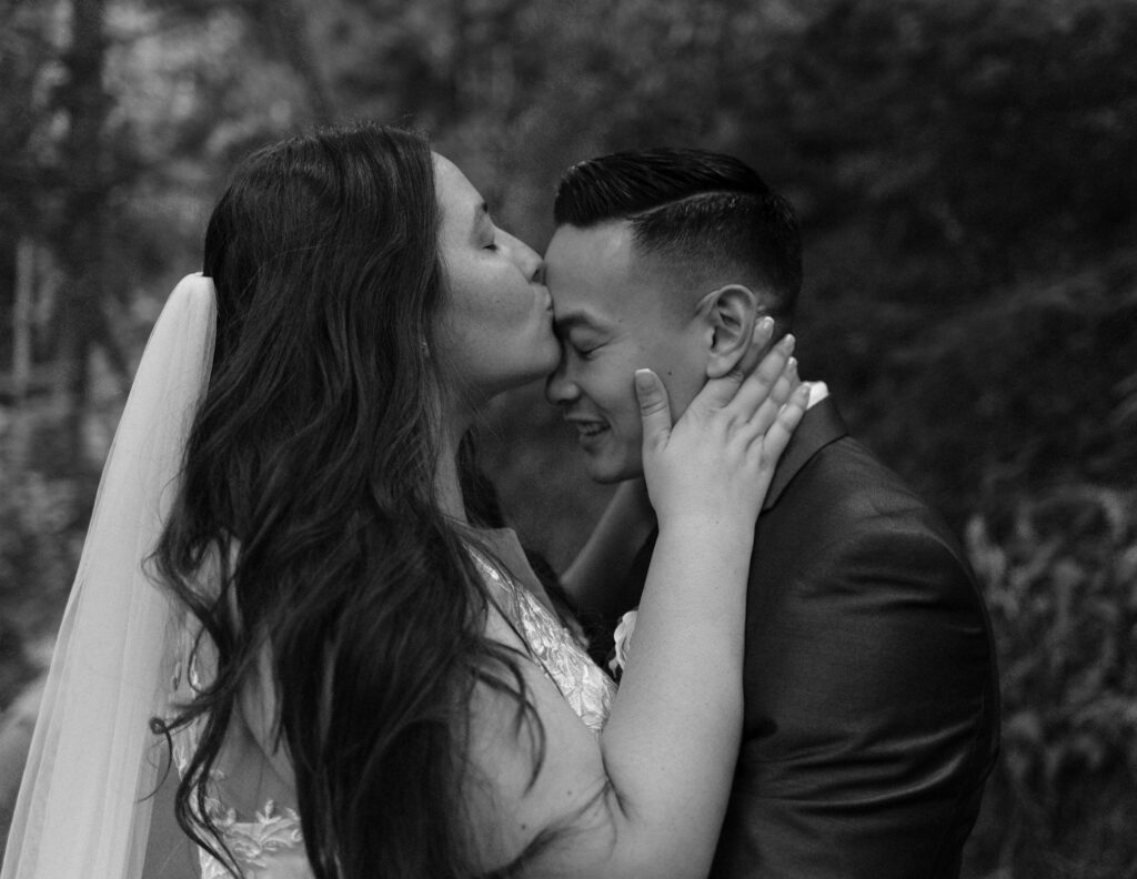 A couple embracing during their Big Sur elopement at Pfeiffer Big Sur State Park.