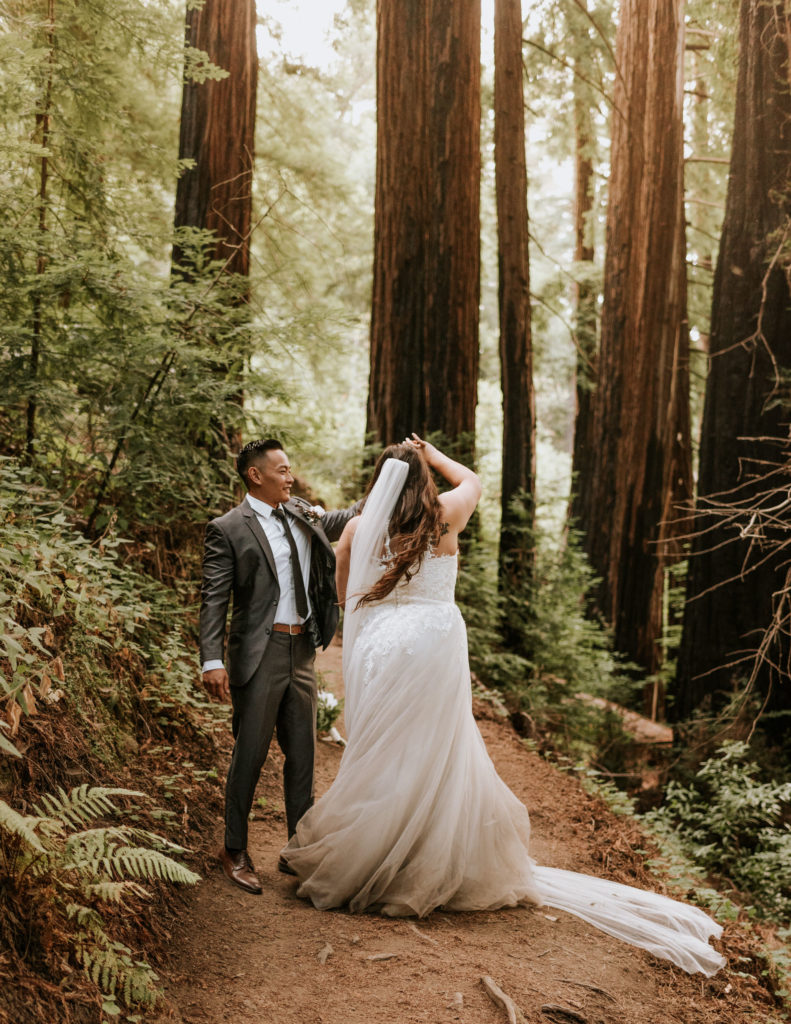 A bride and groom dancing at their elopement in Big Sur.