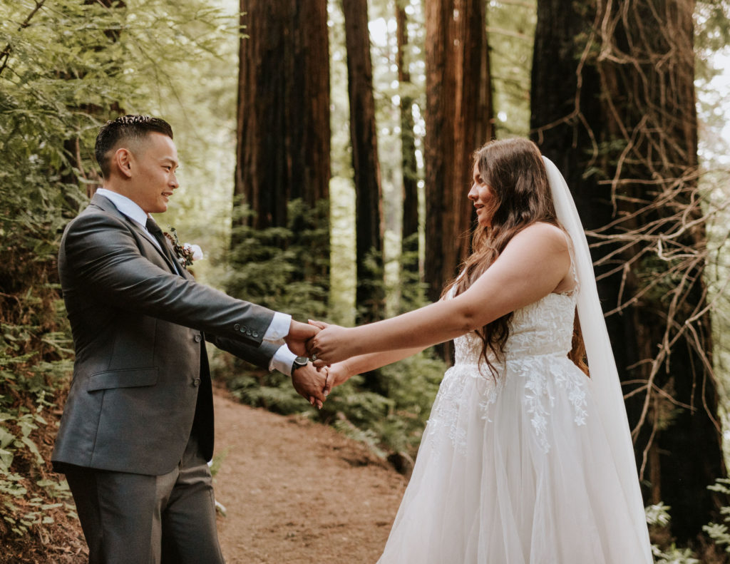 A bride and groom dancing at their elopement in Big Sur.