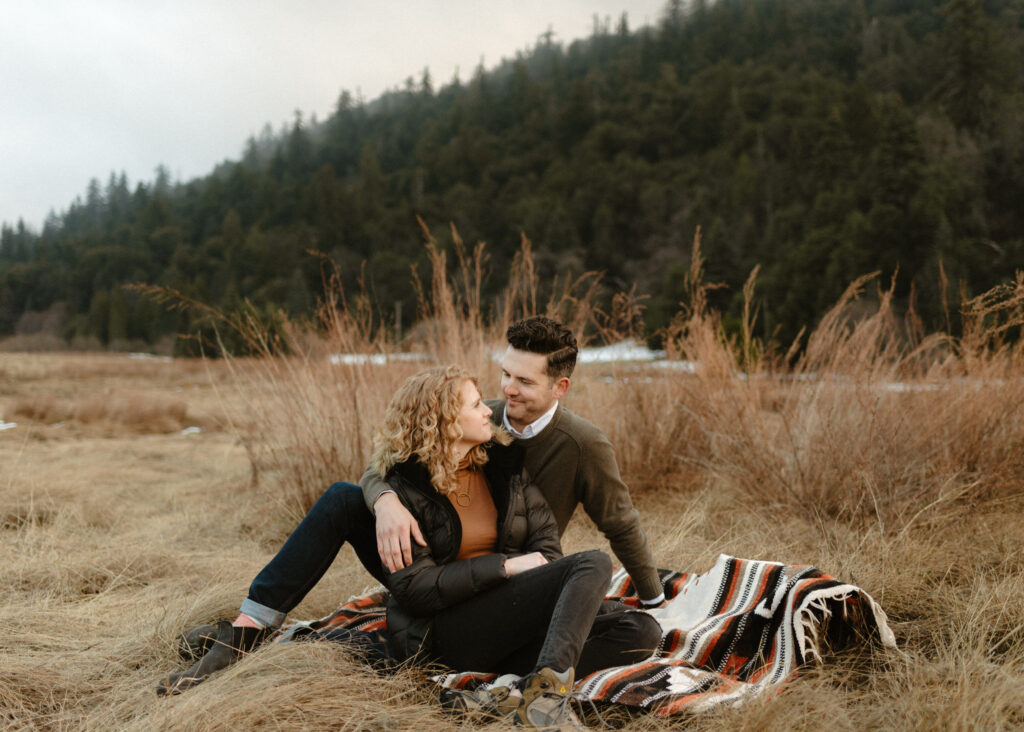 Two people having fun during their Palomar Mountain engagement session.